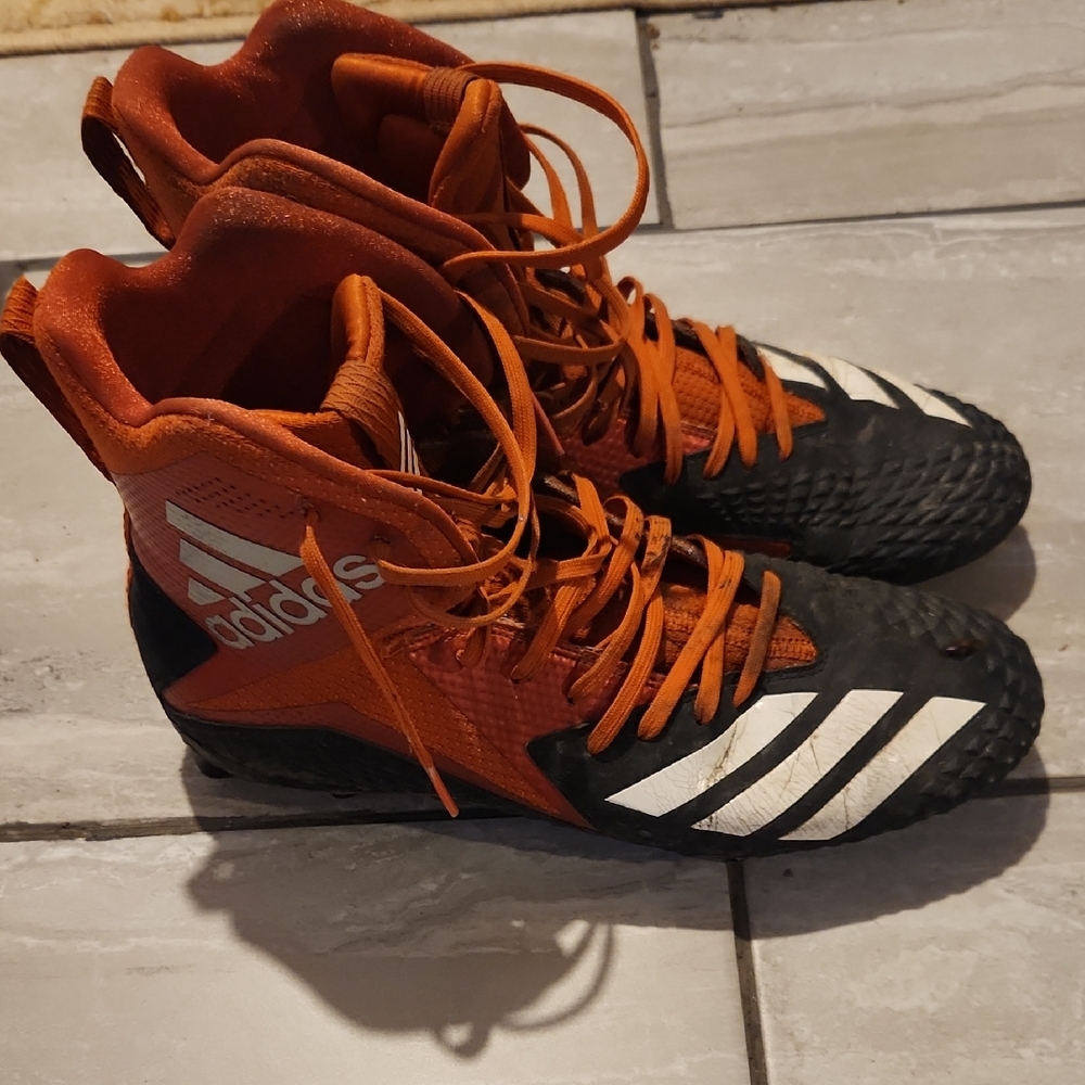 Adidas Black and Orange Football Cleats with White Stripes